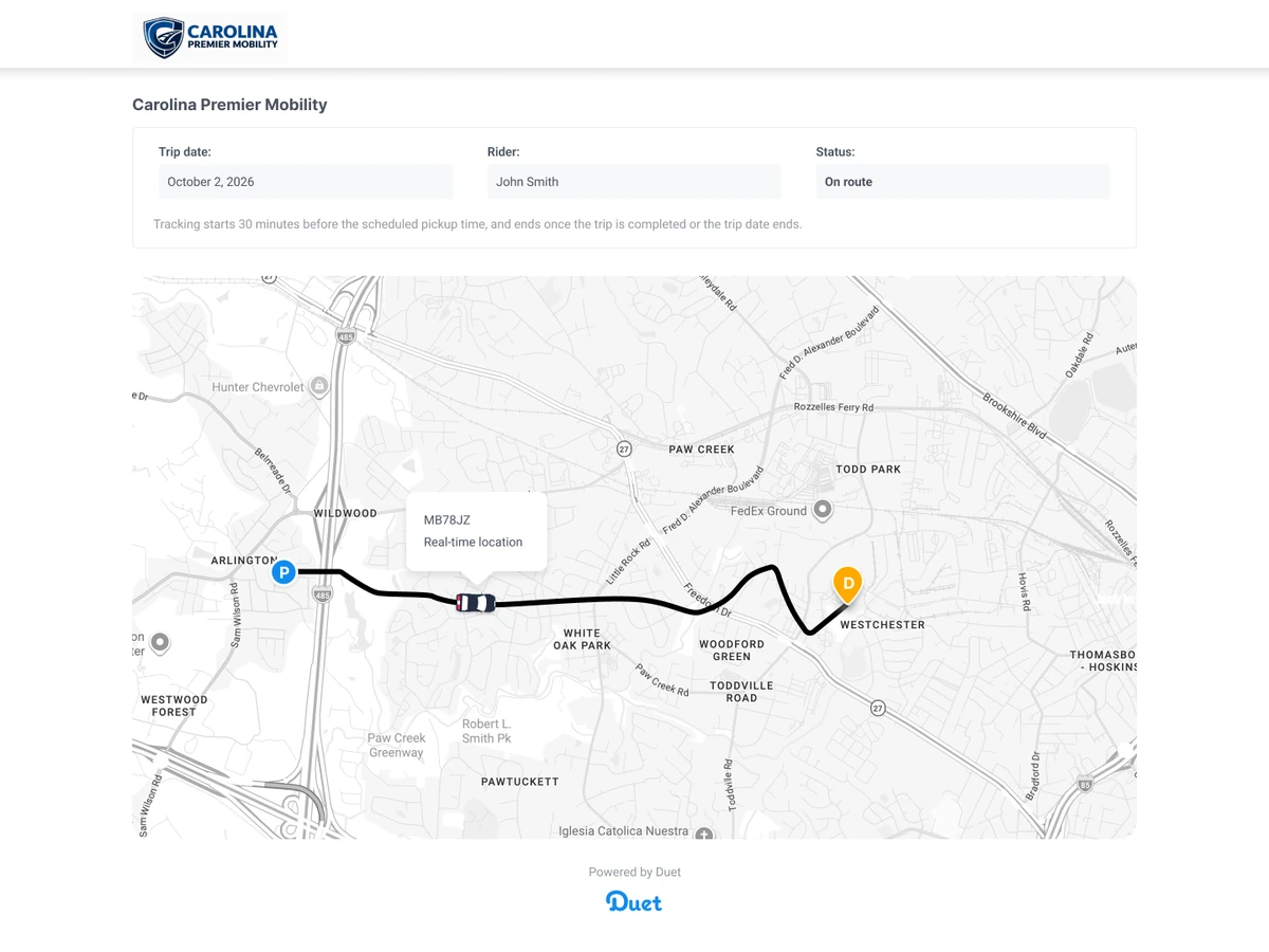 Duet live tracking page for a Carolina Premier Mobility ride: a map of west Charlotte shows the van's real-time location on its route between the pickup and the drop-off.